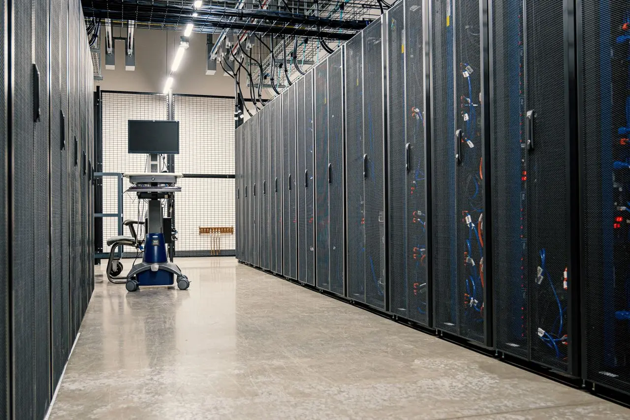 Rows of server racks in a data centre.
